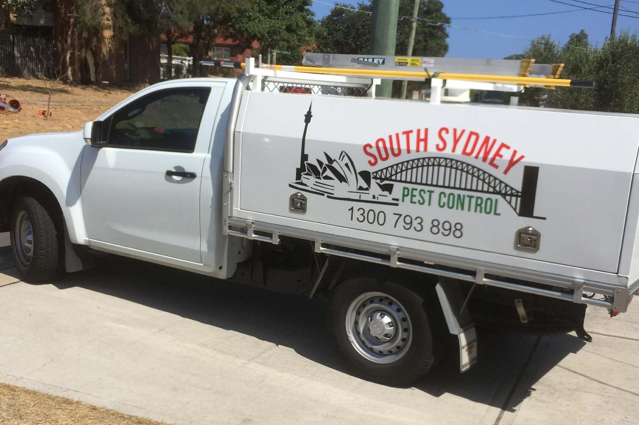 licensed pest control service van
